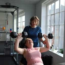 Personal training session at a gym in Leicester, offering one-on-one guidance.